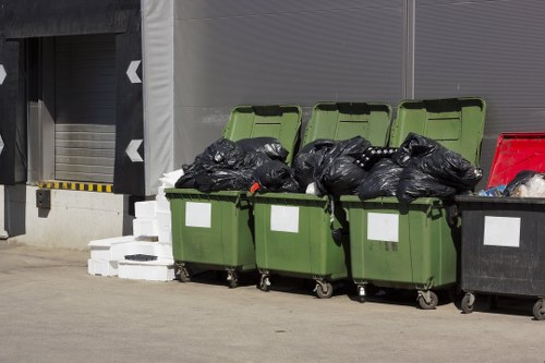 Customer service representative assisting with skip hire