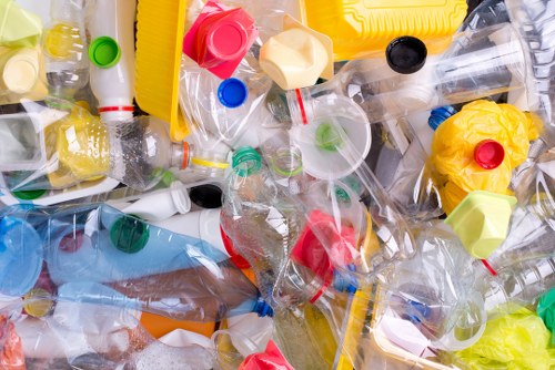 Construction workers managing waste disposal