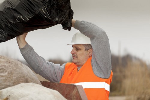 Recycling facilities processing waste from a builders skip in Neasden